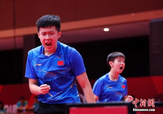 資料圖：雅加達(dá)亞運(yùn)會(huì)，王楚欽/孫穎莎奪得混雙冠軍。 <a target='_blank' href='/'>中新社</a>記者 劉關(guān)關(guān) 攝