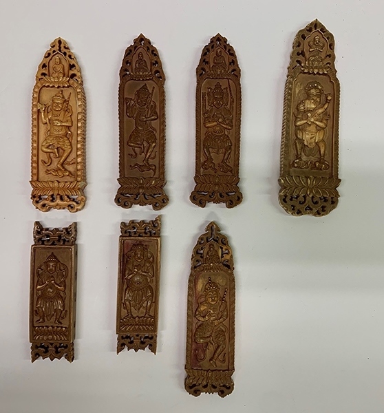 木雕牌飾（暫定名）。國(guó)家文物局供圖