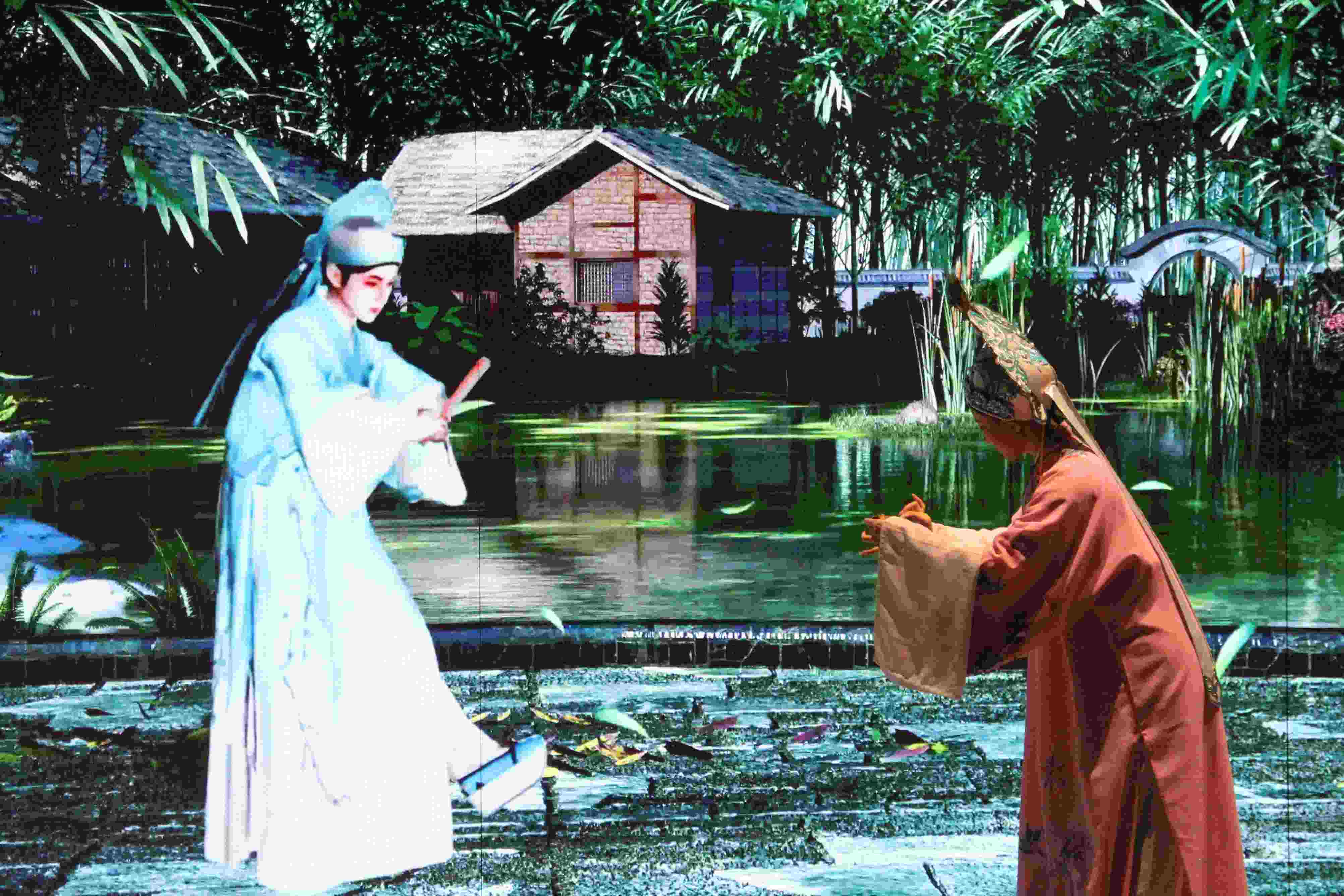 真人演員與虛擬人演員在“元啟金陵”南京數(shù)字文化客廳出演《梁山伯與祝英臺》經(jīng)典選段。受訪者供圖